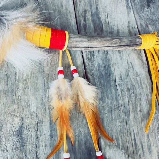 talking stick yellow leather tan fox fur red fabric