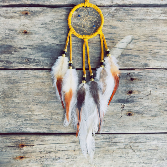 Handcrafted Indigenous dreamcatcher made from natural materials by an Indigenous artisan