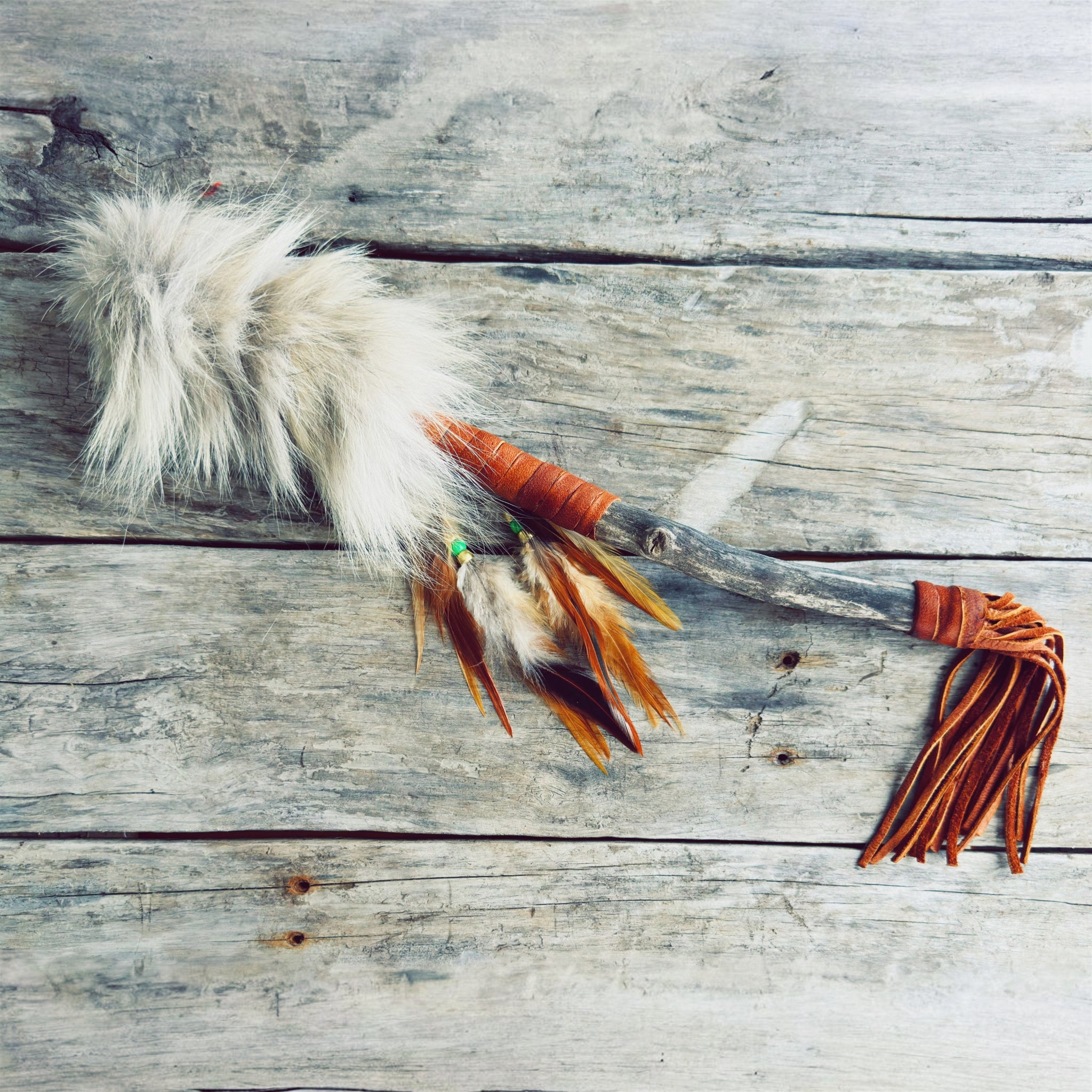 300-year-old aspen talking stick with moose hide and coyote fur