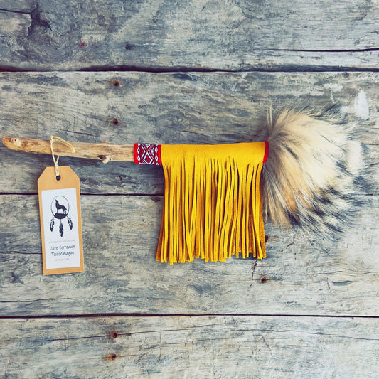 talking stick, yellow leather, tan wolf fur, red fabric with wool