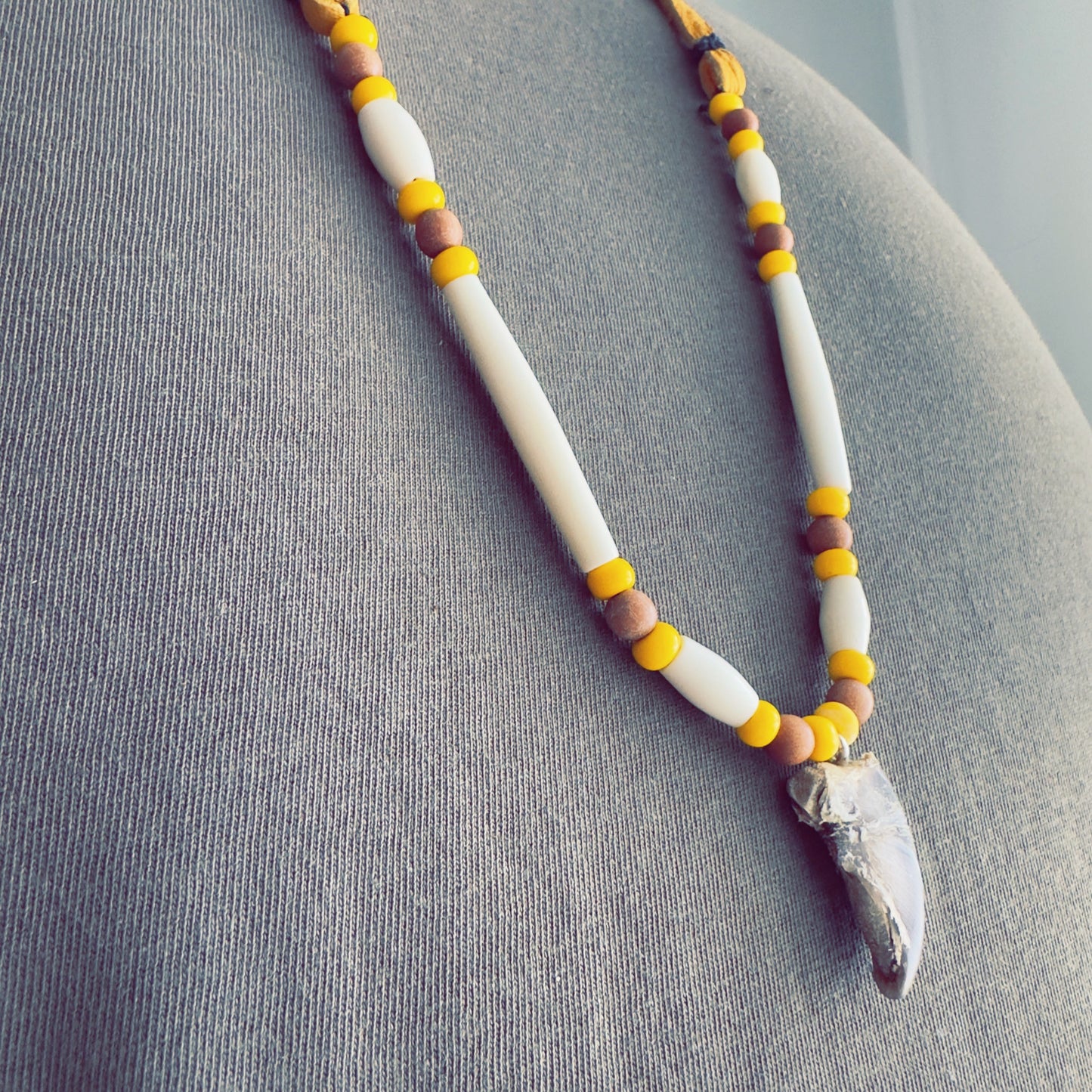 Necklace inspired by bear medicine, crafted with warm brown materials