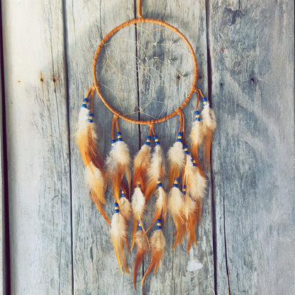 Native dreamcatcher handmade with natural feathers and beads