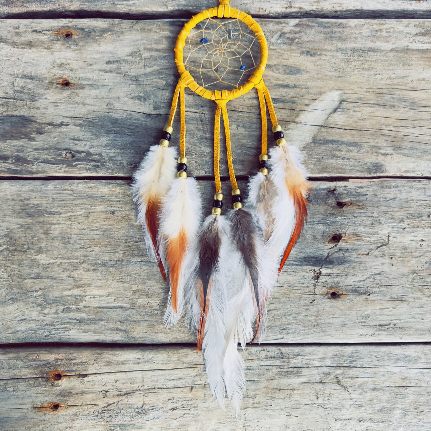 Handcrafted Indigenous dreamcatcher made from natural materials by an Indigenous artisan