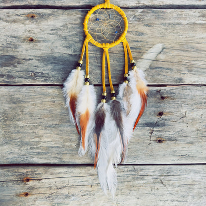 Handcrafted Indigenous dreamcatcher made from natural materials by an Indigenous artisan
