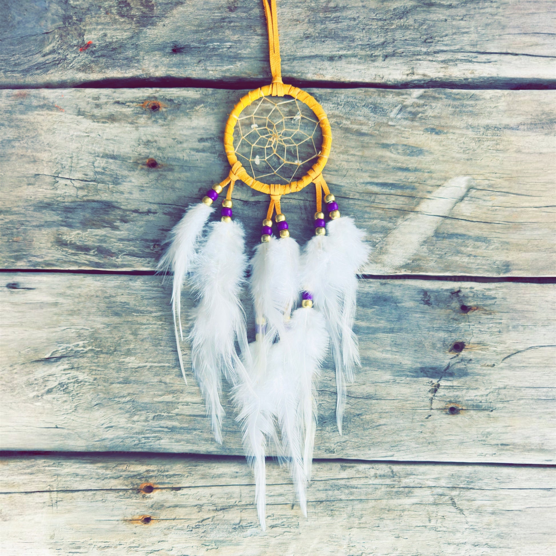 Handcrafted dreamcatcher made with natural elements and symbolism
