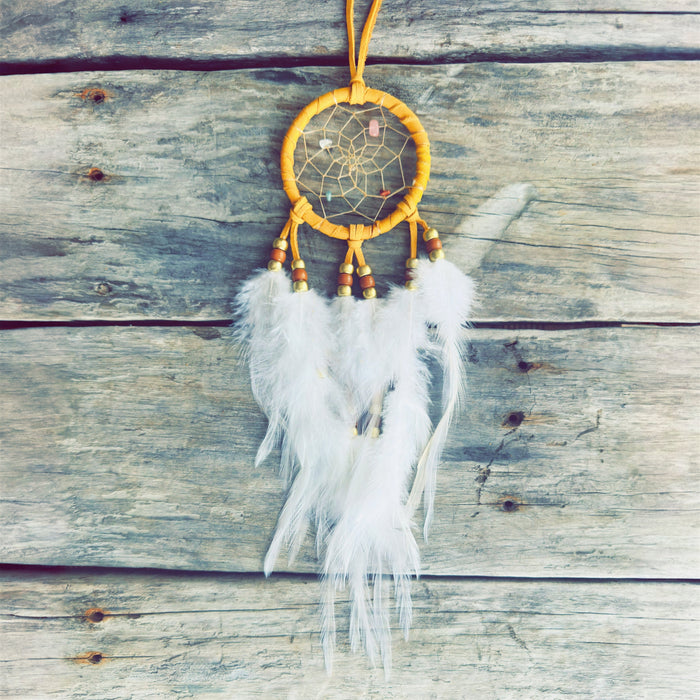 3-inch handmade Native American dreamcatcher yellow and white with natural stones and white feathers