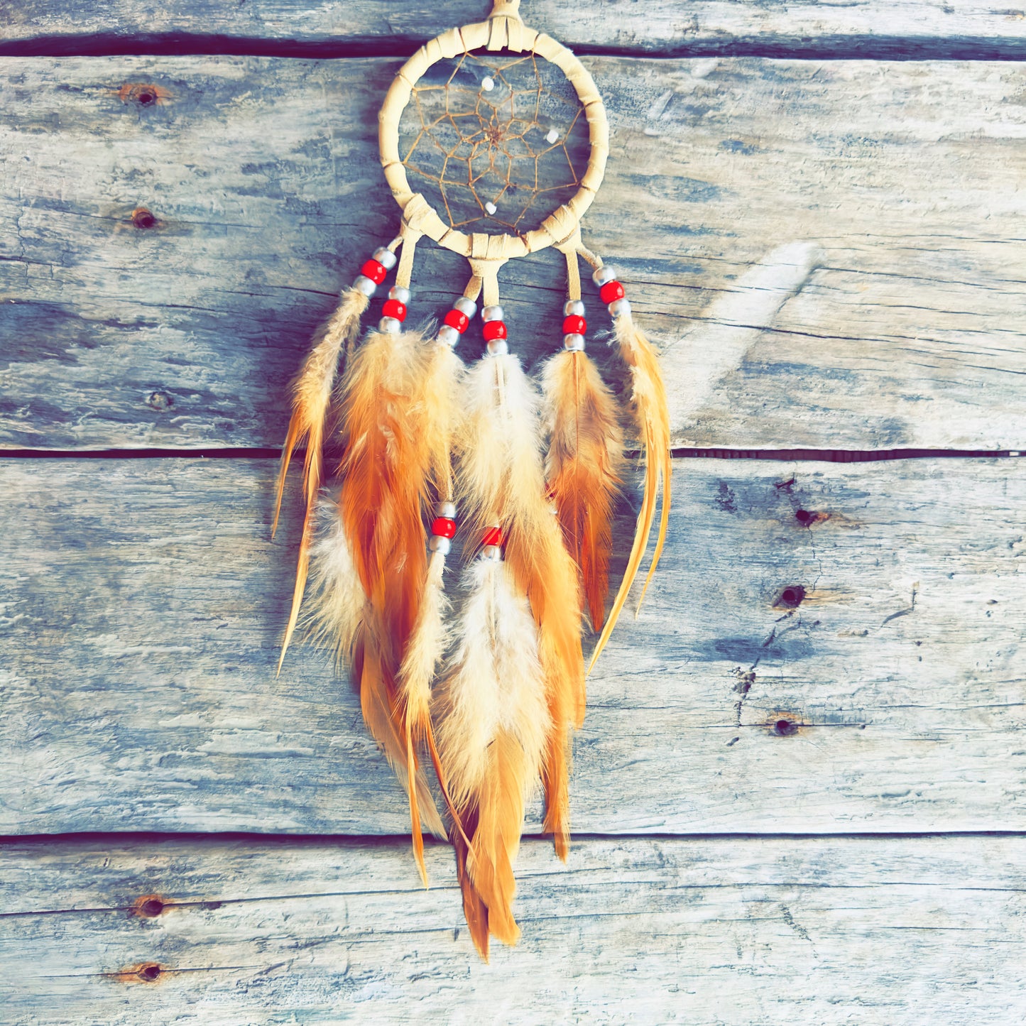 Handmade Indigenous dreamcatcher created using traditional techniques