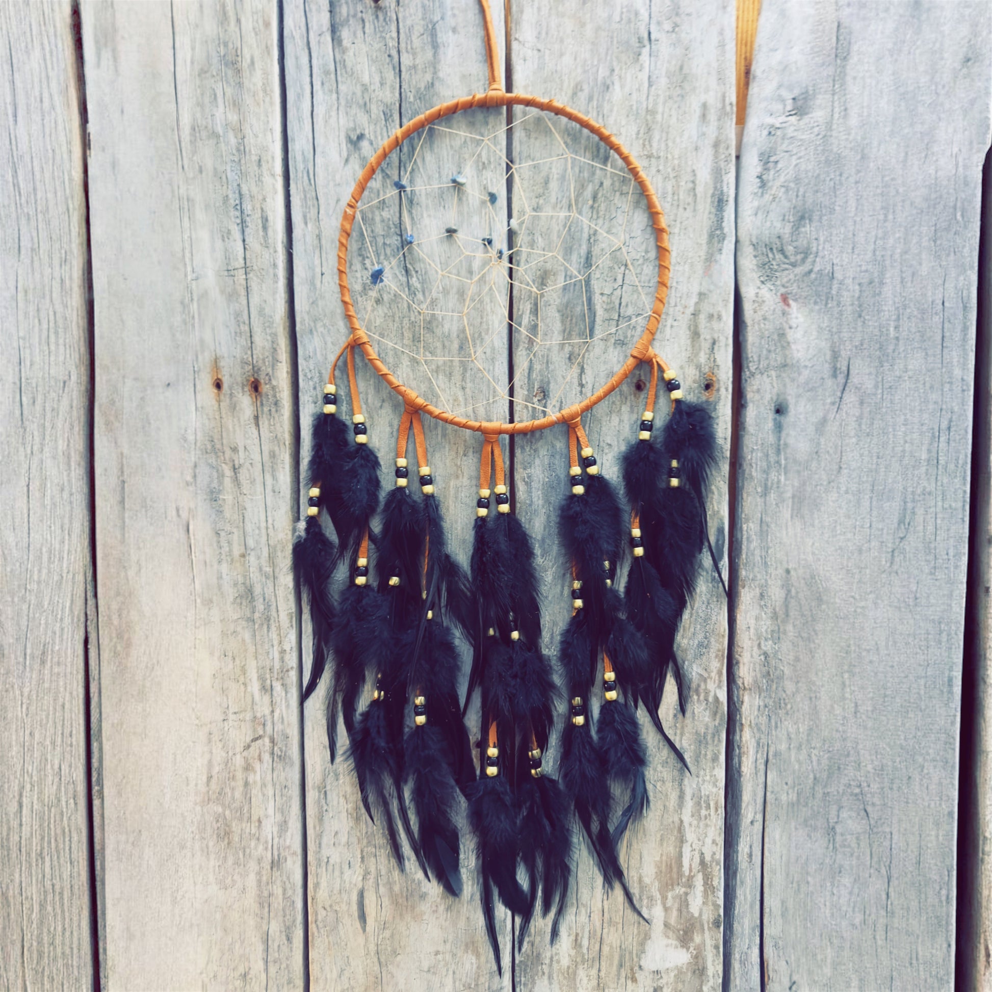 Indigenous artisan dreamcatcher created as a unique symbolic piece
