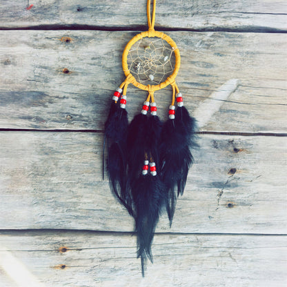 Handmade Indigenous dreamcatcher crafted with natural materials