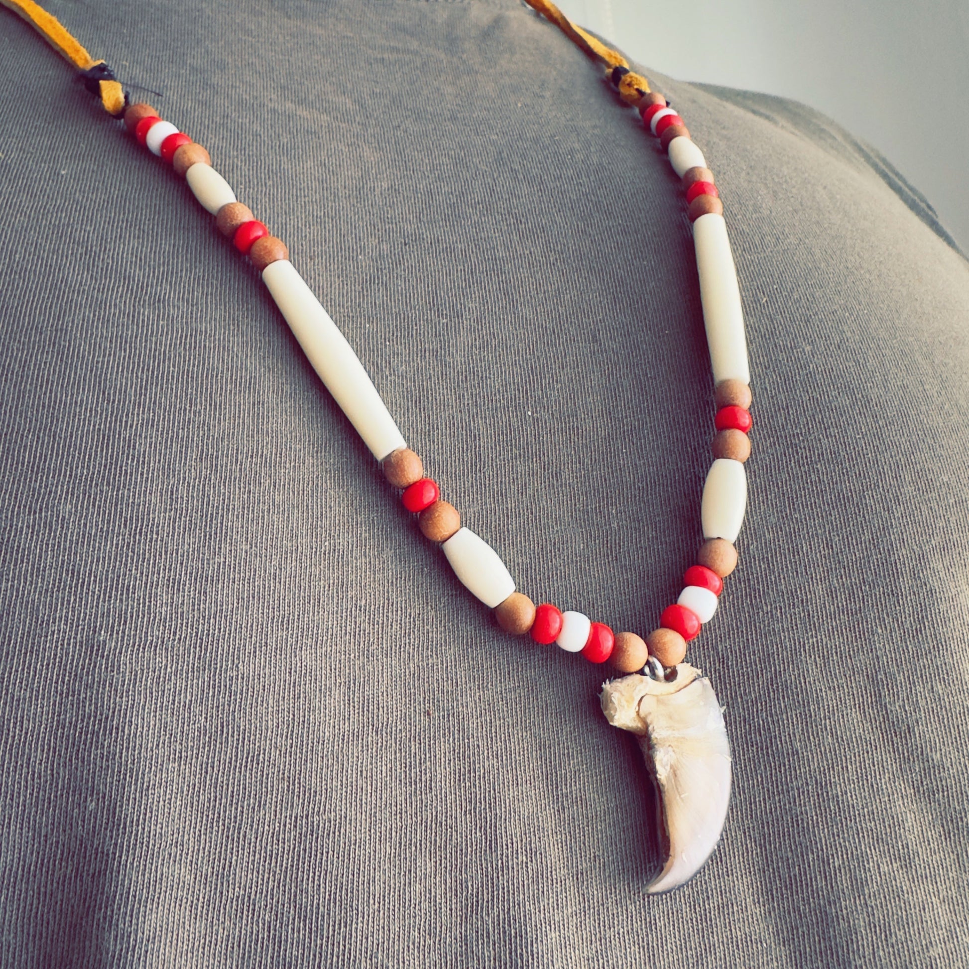 Necklace symbolizing bear strength with warm brown beads