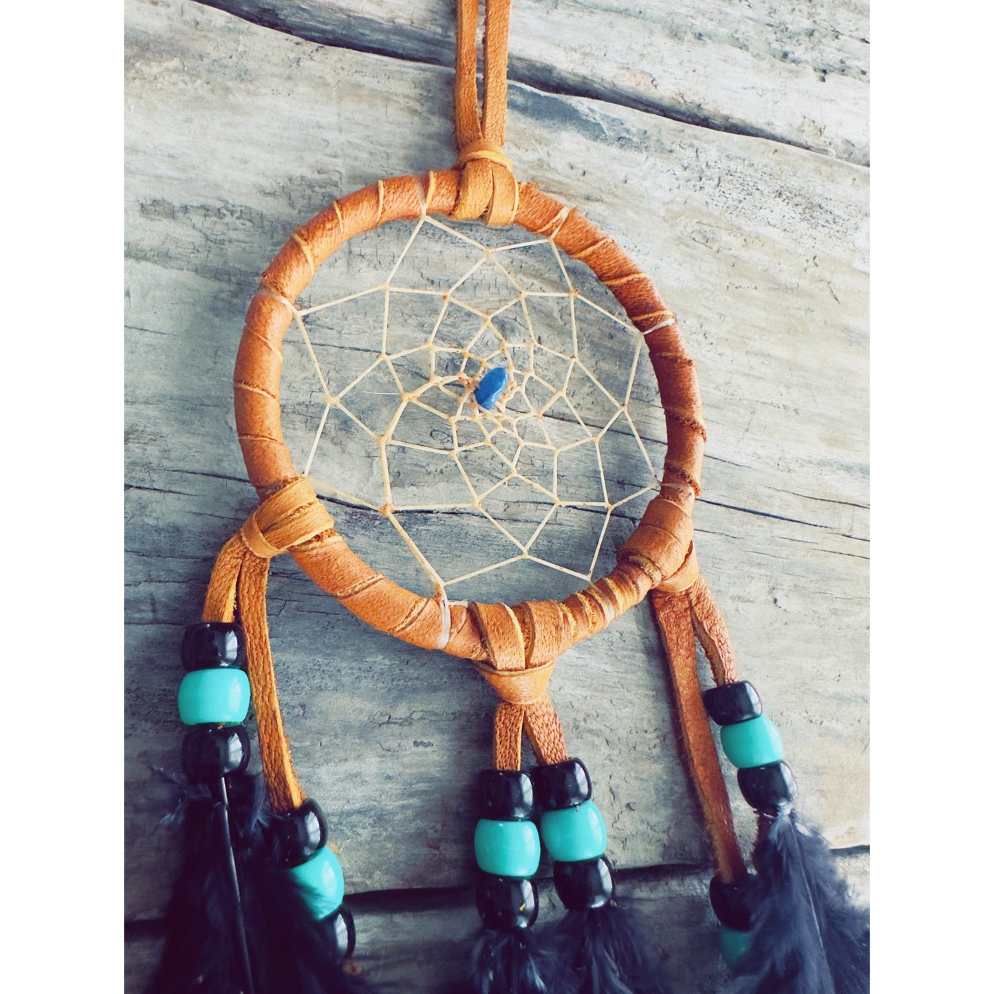 Handmade Native dreamcatcher crafted in Quebec, authentic spiritual art inspired by the land and ancestral stories.