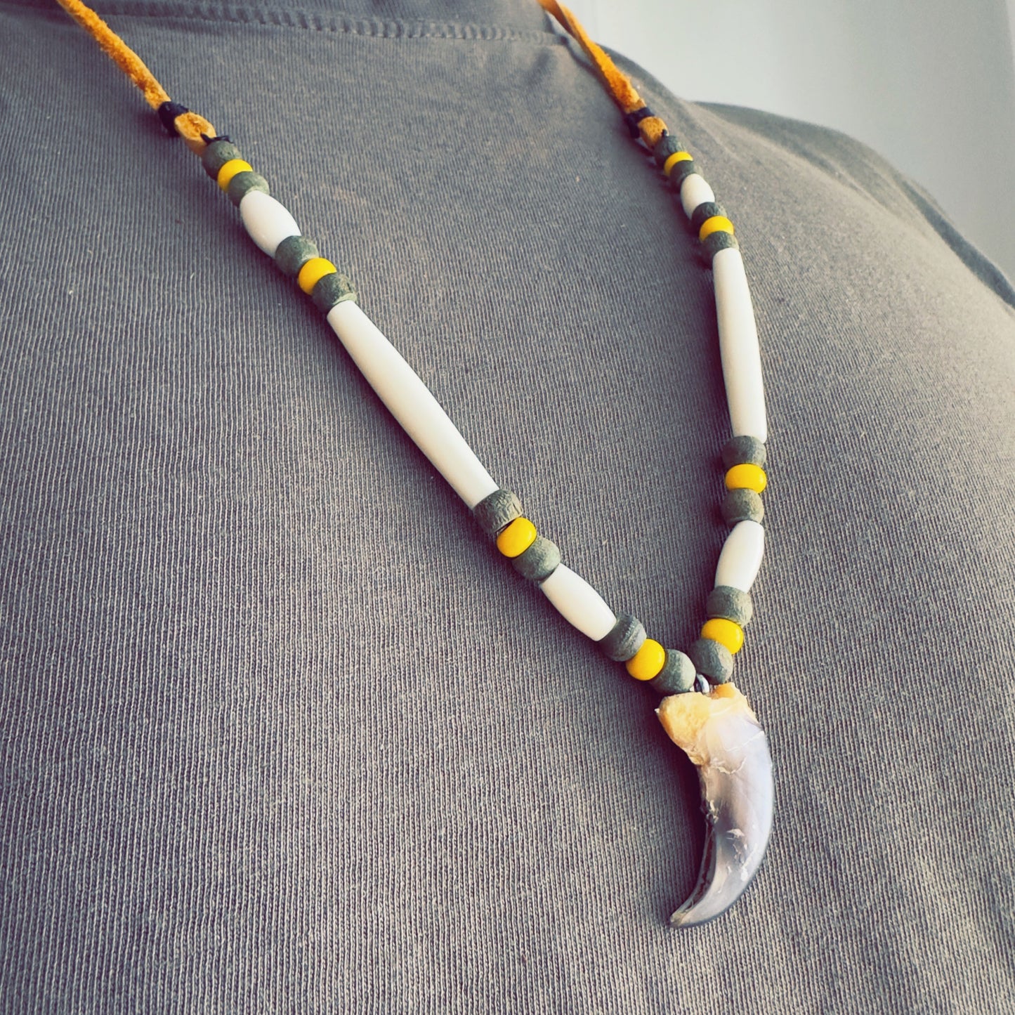 Woodland-inspired necklace crafted with earthy colors and tribal pattern