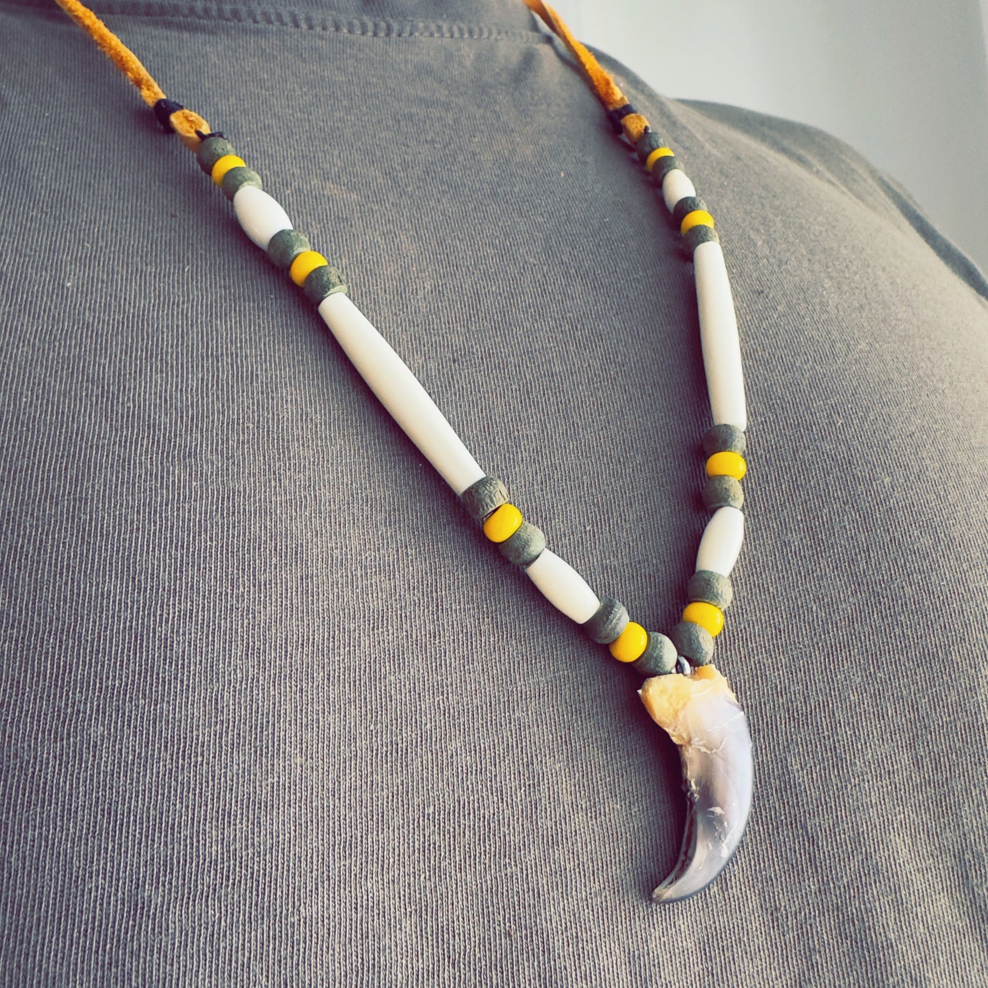 Woodland-inspired necklace crafted with earthy colors and tribal pattern