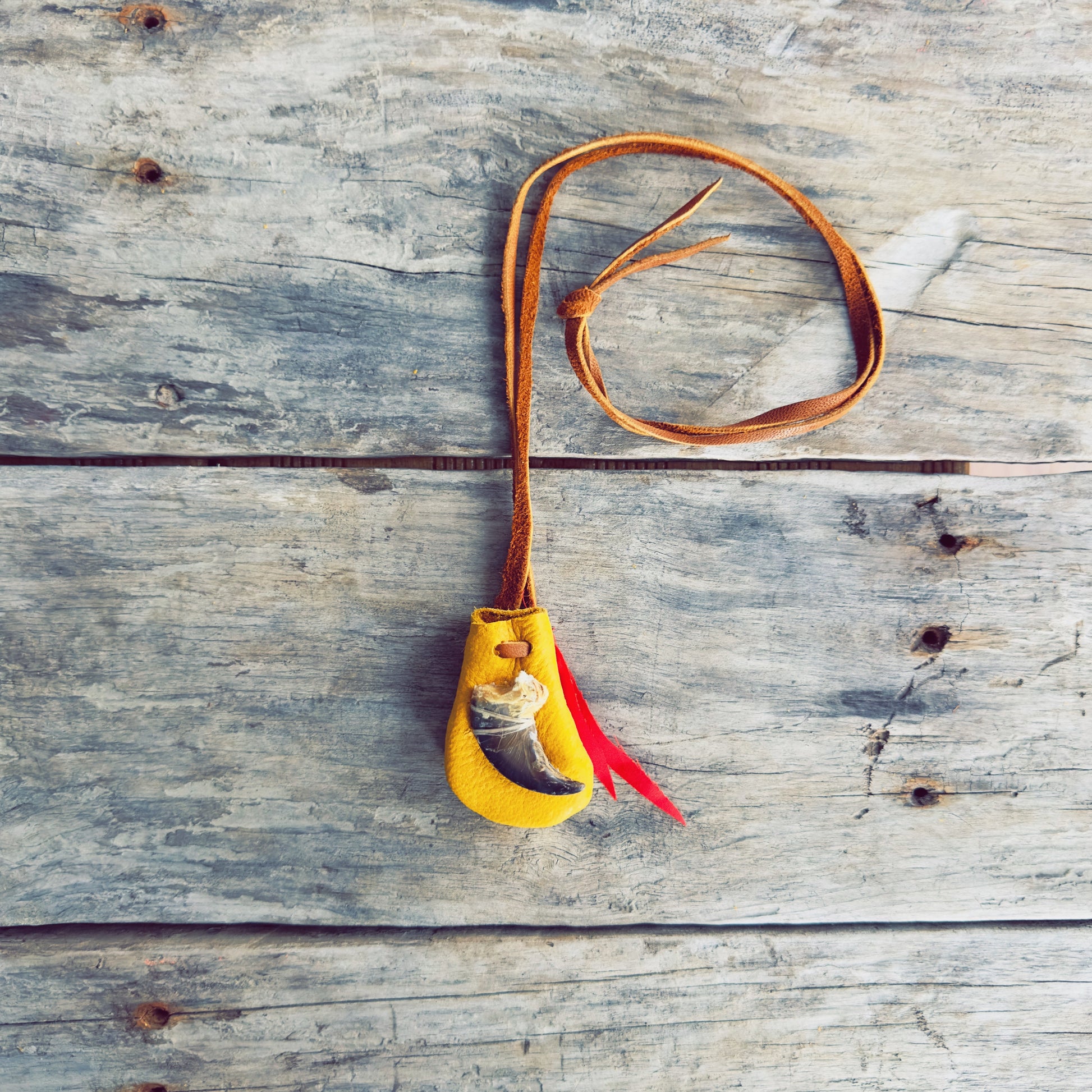 Indigenous bear medicine pouch handcrafted from natural materials by an Indigenous artisan