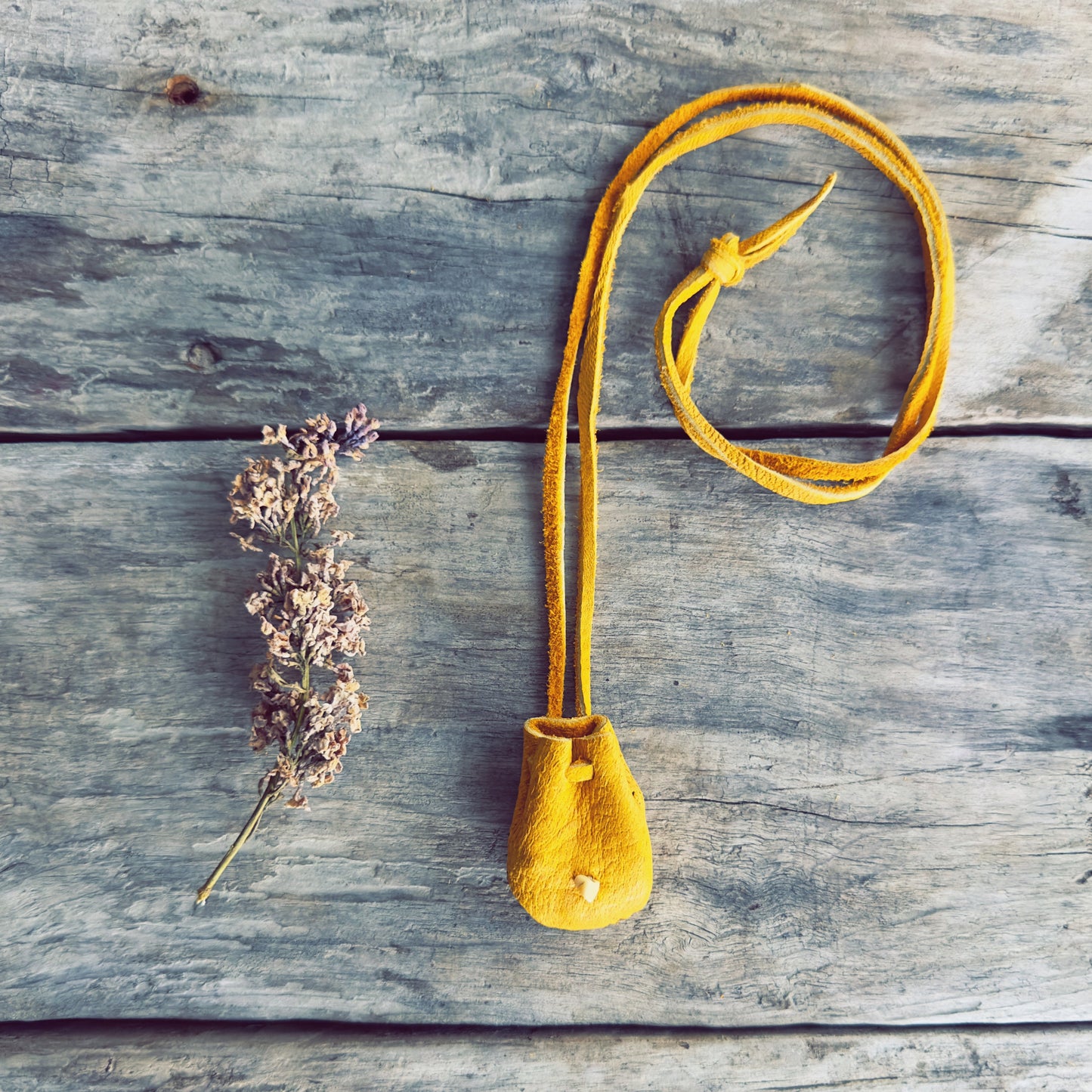 Handcrafted medicine pouch inspired by Indigenous traditions with leather