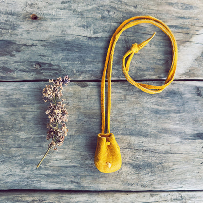 Handcrafted medicine pouch inspired by Indigenous traditions with leather