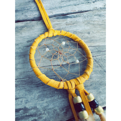 Traditional Native dreamcatcher handmade in Canada, filtering bad dreams while protecting sacred rest.