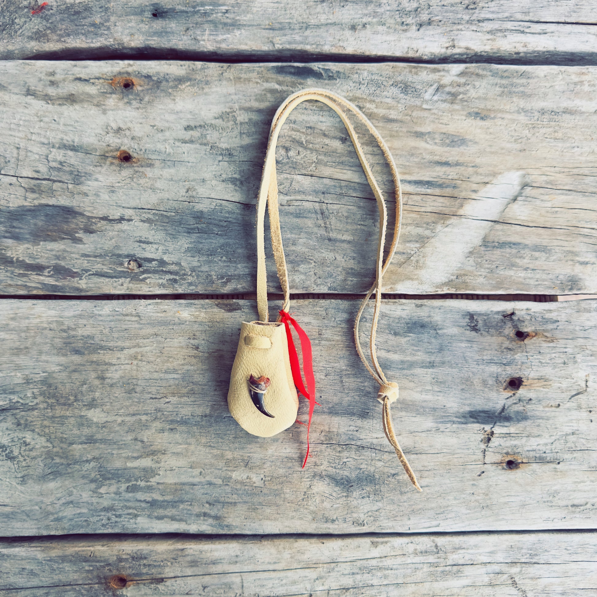 Handcrafted wolf medicine bag made with genuine moose leather